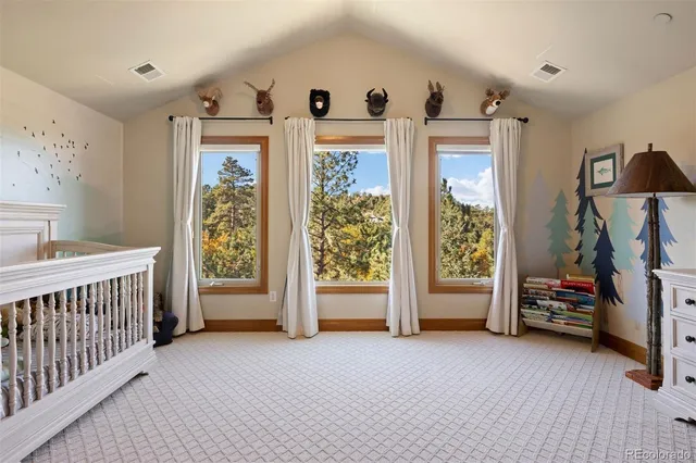 a view of livingroom with furniture and windows