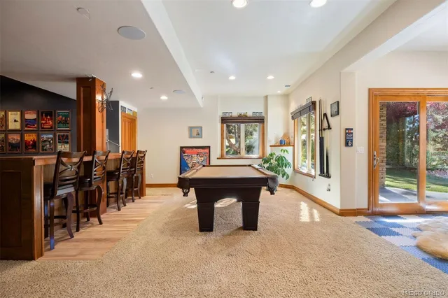 a living room with lots of furniture and a flat screen tv