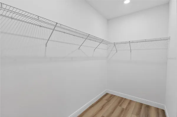 a view of a room with racks on the wall