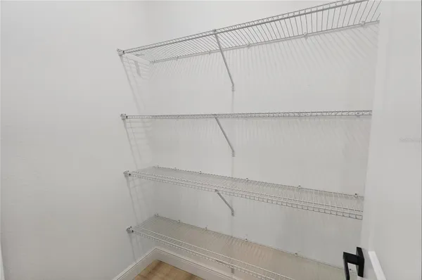 a view of an empty walk in closet