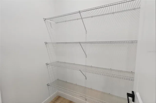 a view of an empty walk in closet