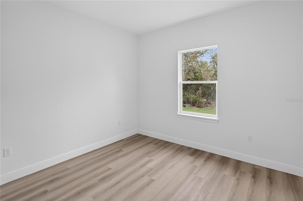 15028 Southwest 25th Circle Ocala, FL 34473 - Photo 25 of 35 an empty room with a window