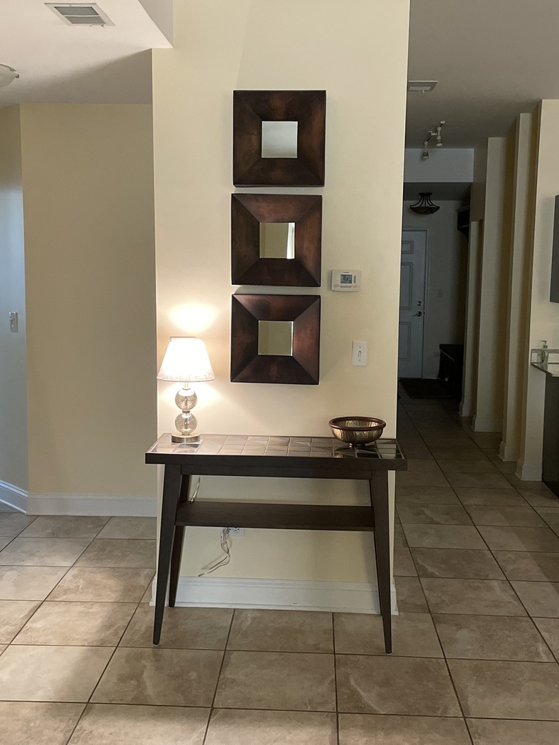 a living room with a table and a table