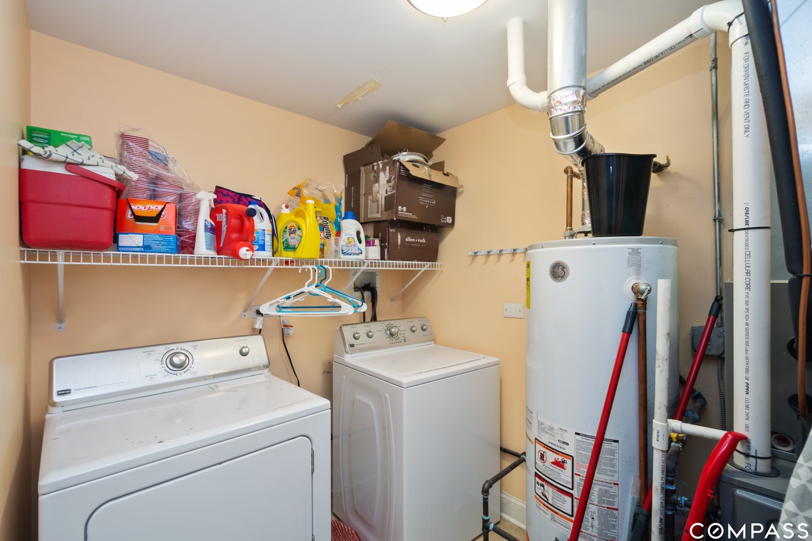 2801 West Ardmore Avenue, Unit 1A Chicago, IL 60659 - Photo 6 of 12 a utility room with dryer and washer