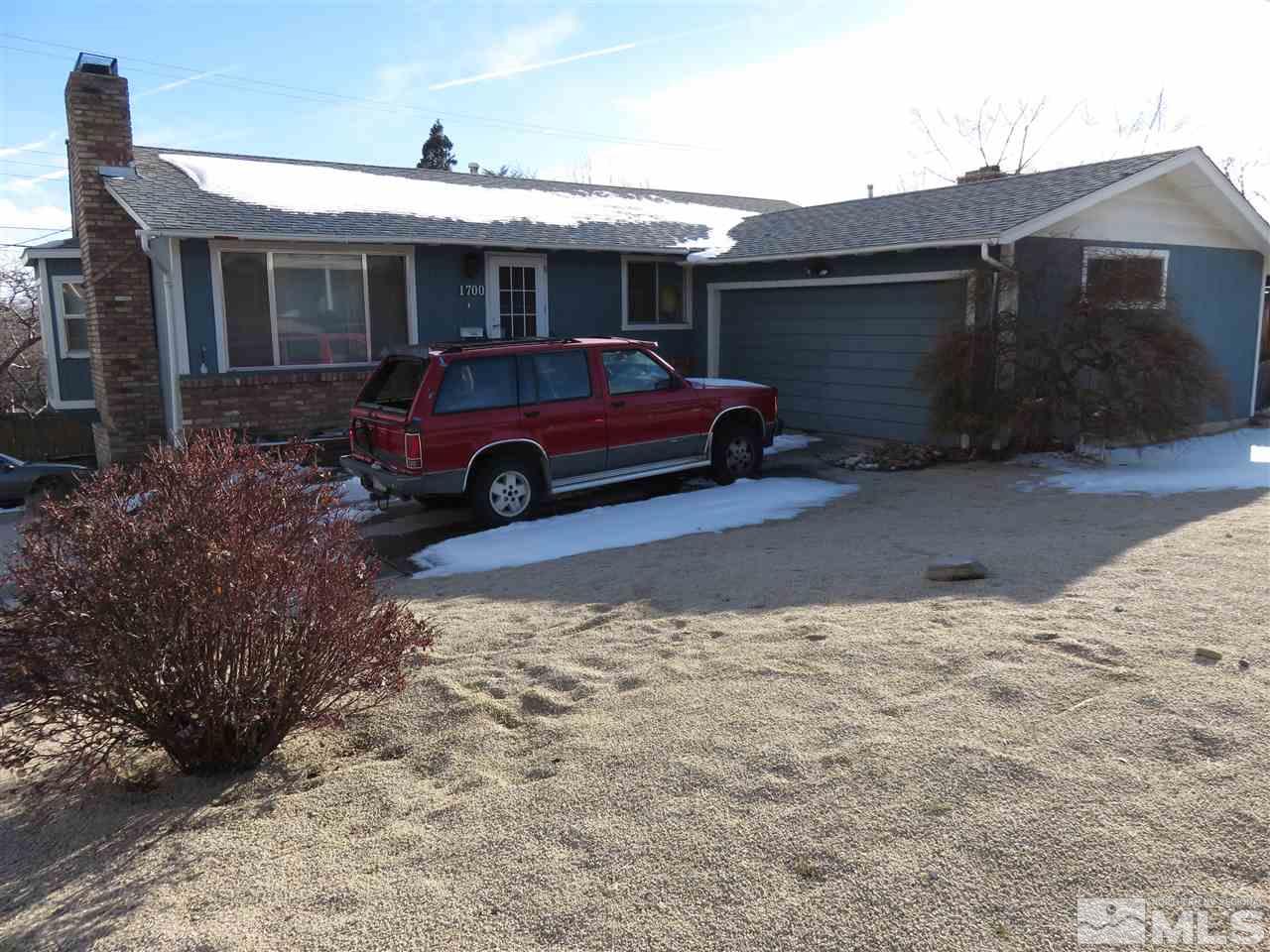 1700 Carlin Street Reno, NV 89503 - Photo 1 of 1 a view of a car in front of house
