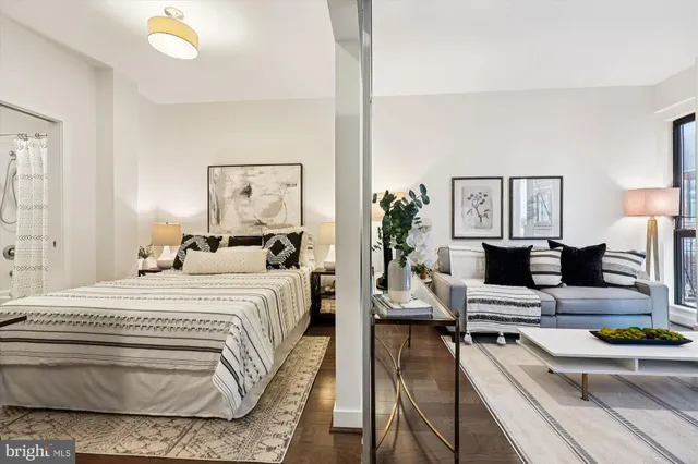 a bedroom with a bed and furniture