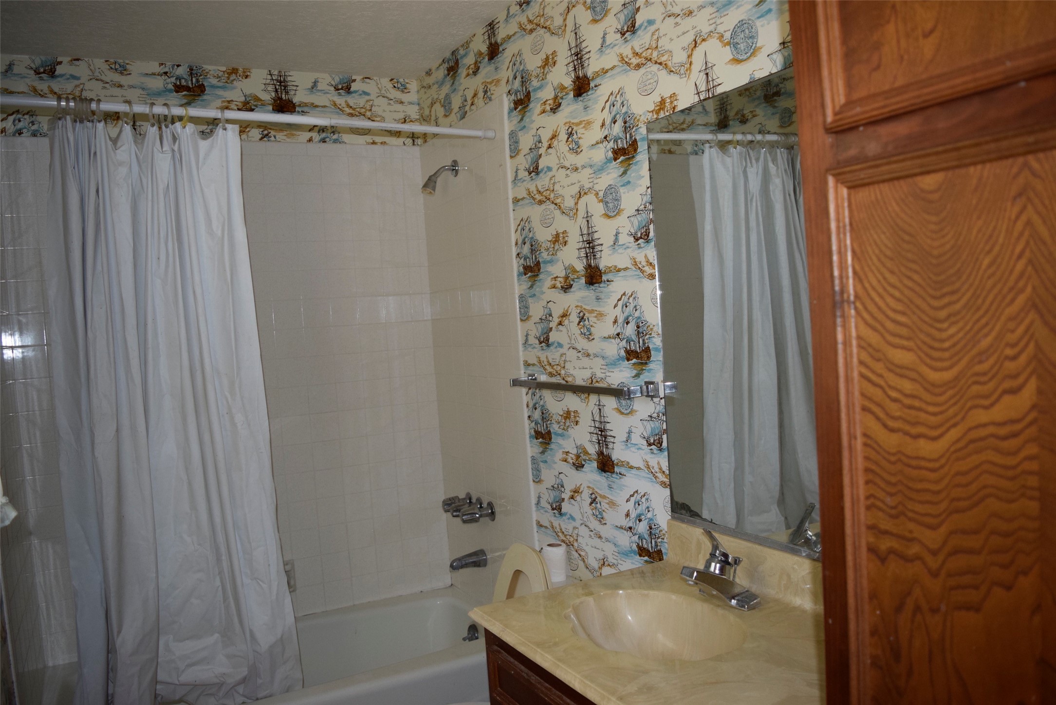 732 River Road Goodrich, TX 77335 - Photo 16 of 20 a bathroom with a sink and a mirror