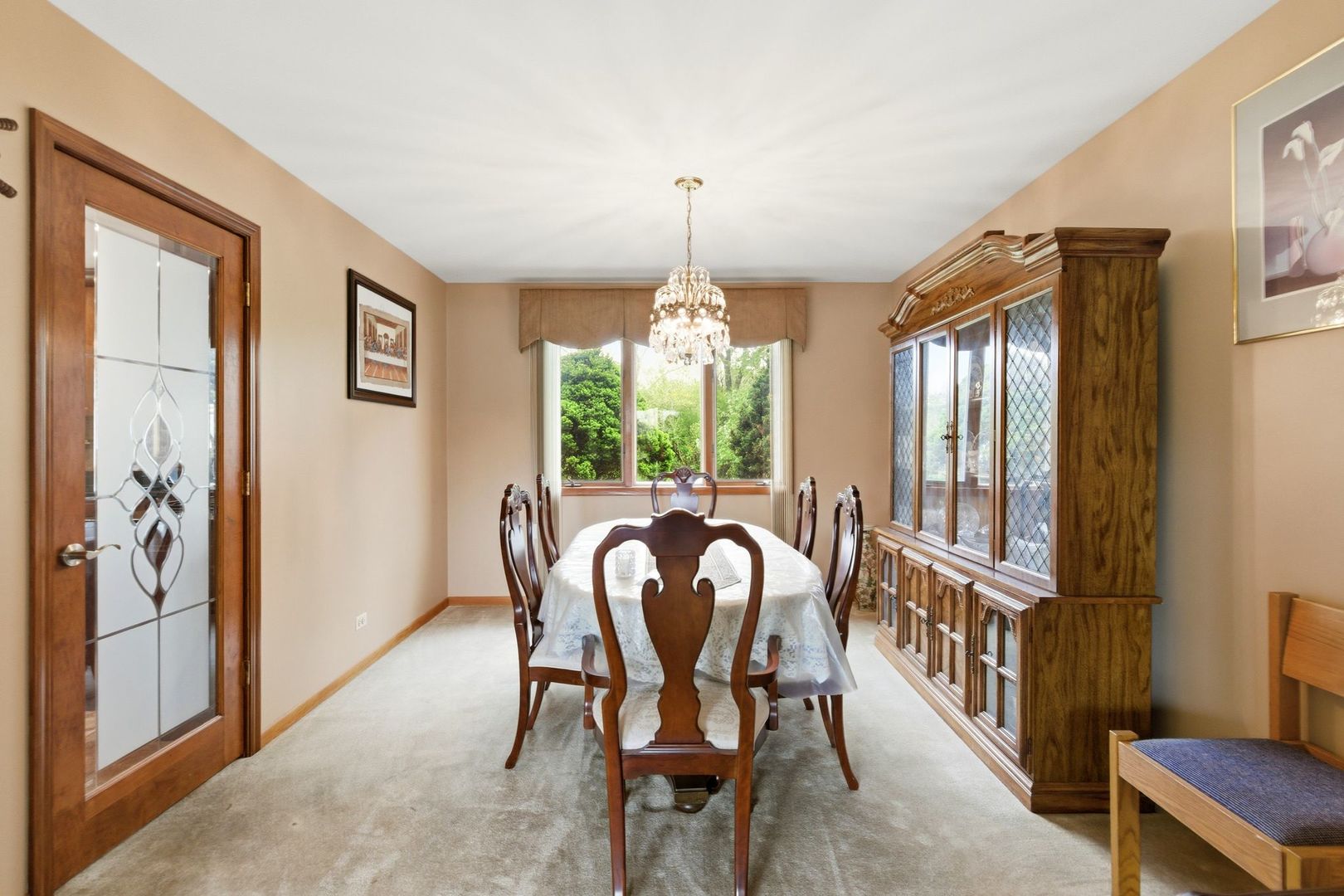 1735 Larson Lane Roselle, IL 60172 - Photo 11 of 35 a view of a dining room with furniture window and wooden floor