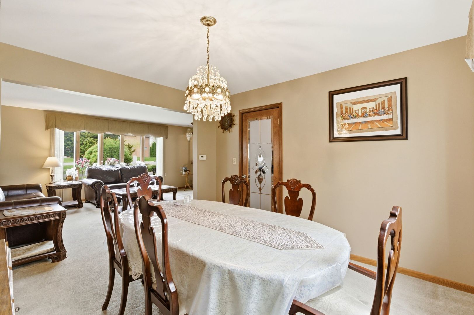 1735 Larson Lane Roselle, IL 60172 - Photo 12 of 35 a view of a dining room with furniture window and outside view