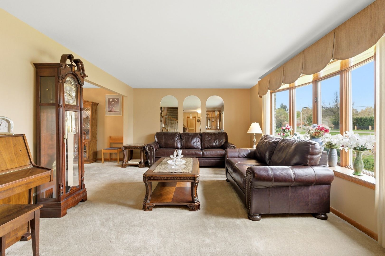 1735 Larson Lane Roselle, IL 60172 - Photo 7 of 35 a living room with furniture and a large window