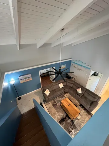 a view of workspace with lounge chair