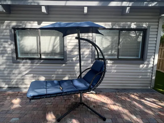 a view of yard with swimming pool