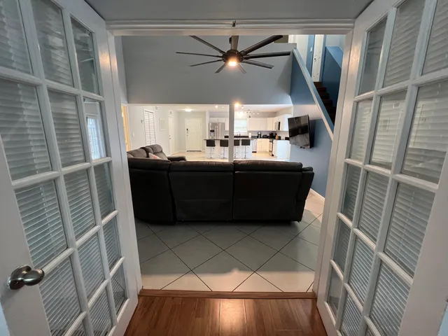 a view of cabinets and wooden floor