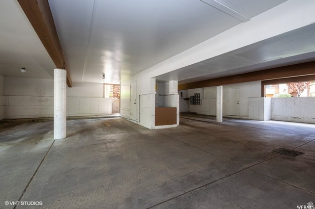 6852 Countrywoods Circle, Unit 5D Midvale, UT 84047 - Photo 35 of 50 Owners spot center. Garbage collection on right.