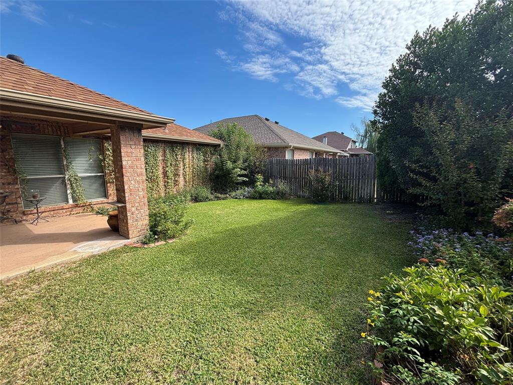 3516 Desert Mesa Road Fort Worth, TX 76262 - Photo 15 of 16 Beautifully landscaped backyard