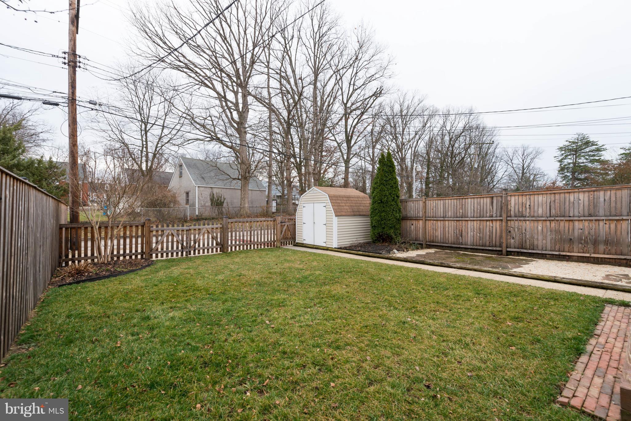 1808 Edgewood Road Towson, MD 21286 - Photo 28 of 30 Fence, shed, parking pad + trash can corral (2012)