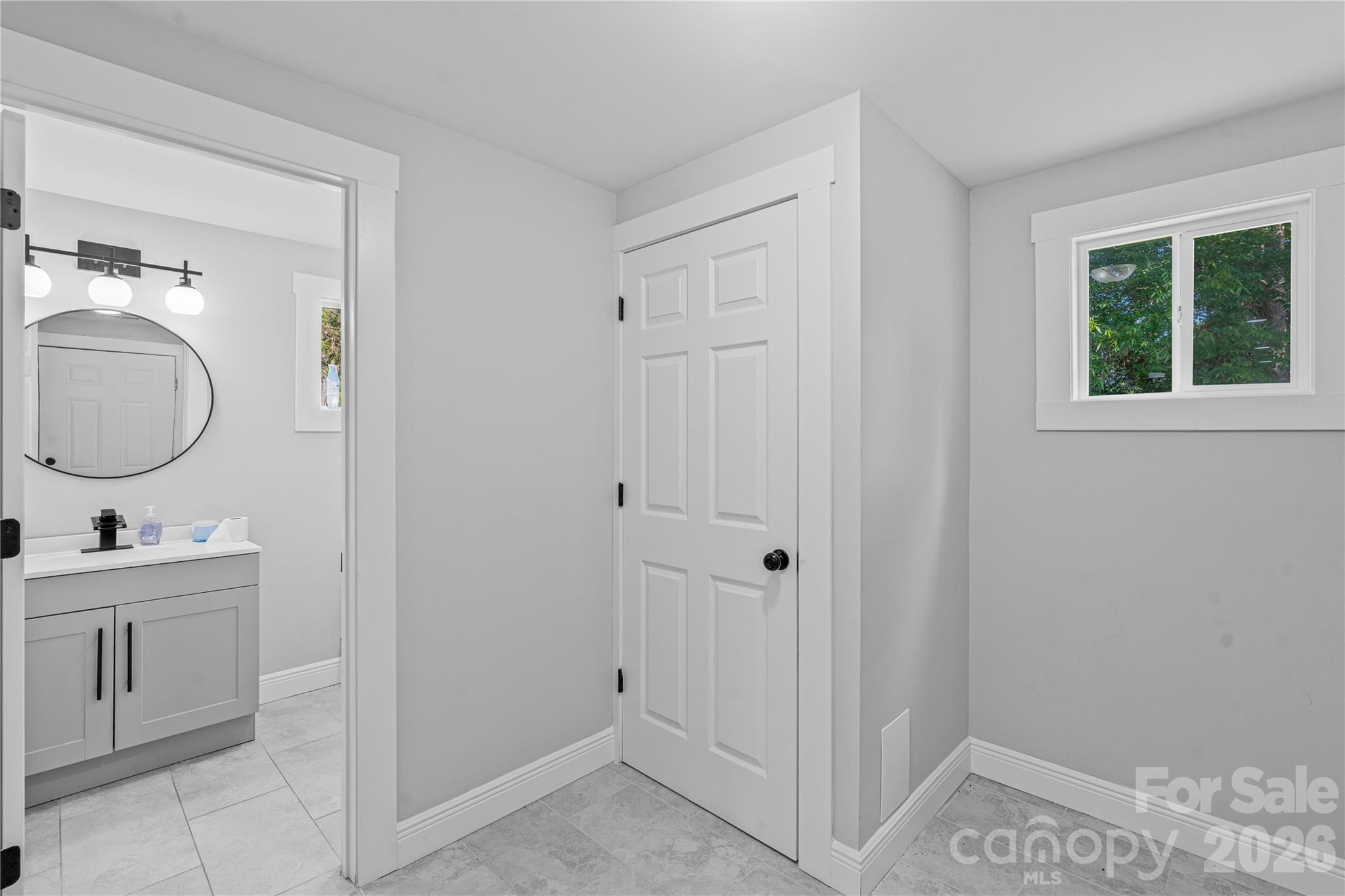 906 Gladstone Street Florence, SC 29501 - Photo 10 of 15 a bathroom with a sink and a mirror