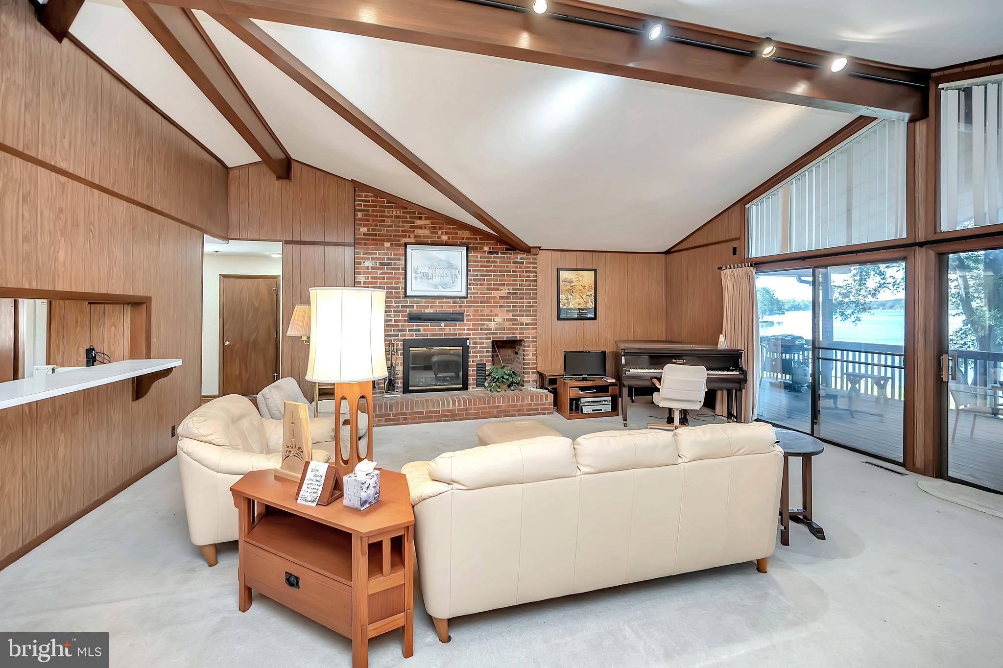 129 Greenspring Road Locust Grove, VA 22508 - Photo 12 of 27 Living room boasts floor to ceiling fireplace