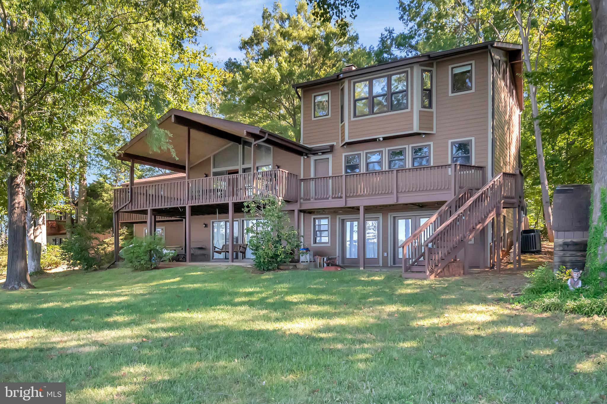 129 Greenspring Road Locust Grove, VA 22508 - Photo 2 of 27 View of the home from the lake