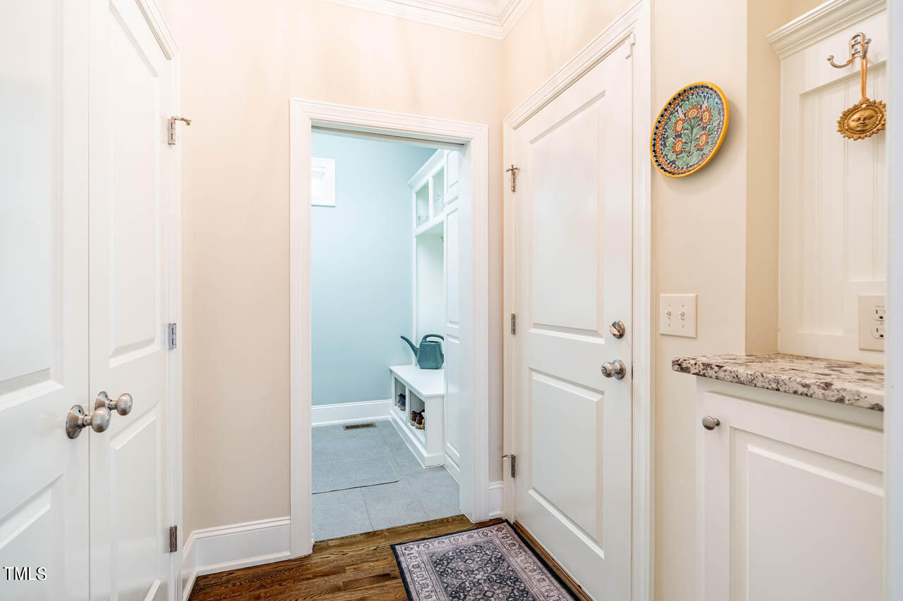 499 Bennett Mountain Trace Chapel Hill, NC 27516 - Photo 24 of 75 a view of bathroom with a sink and a mirror