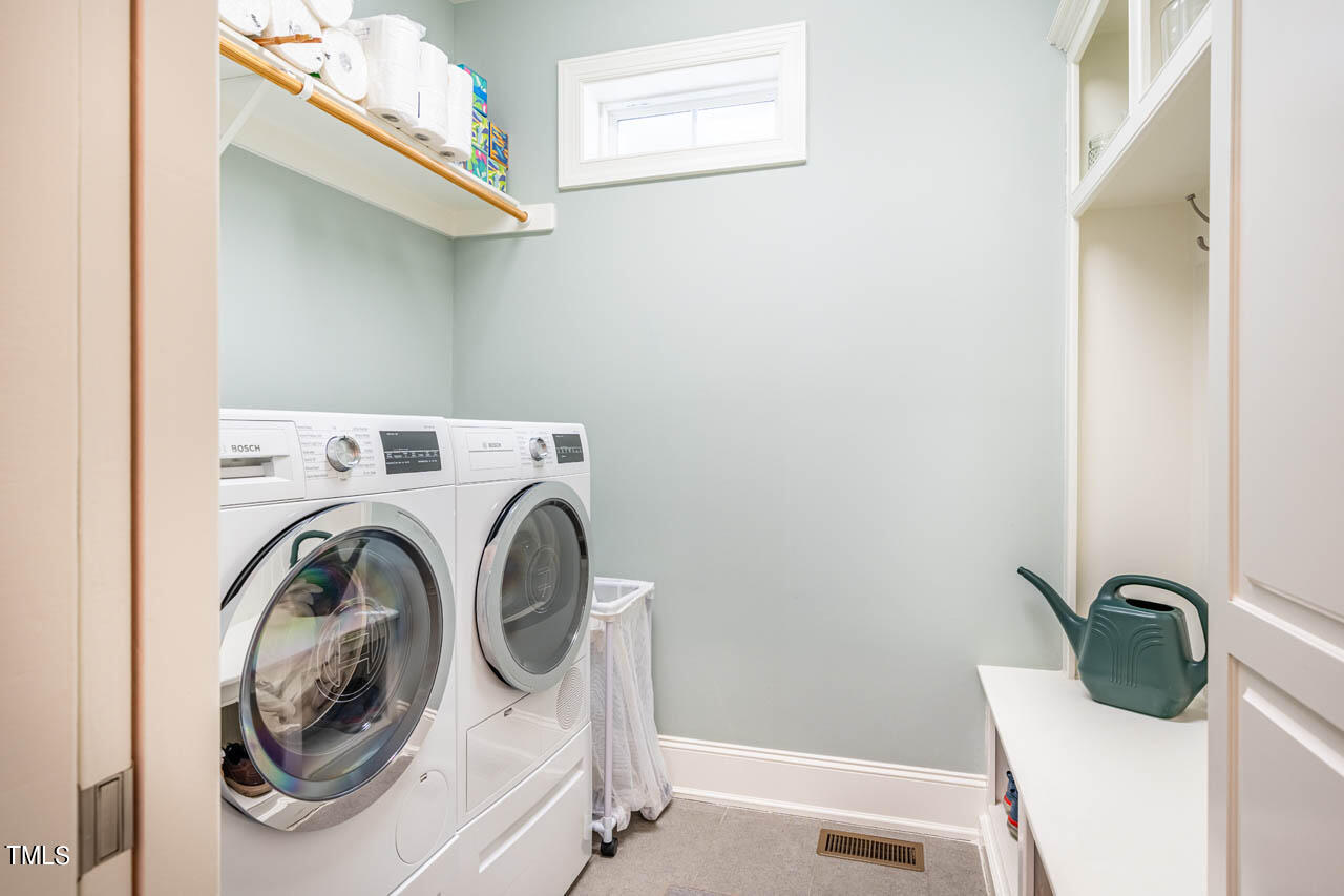 499 Bennett Mountain Trace Chapel Hill, NC 27516 - Photo 25 of 75 a utility room with dryer and washer