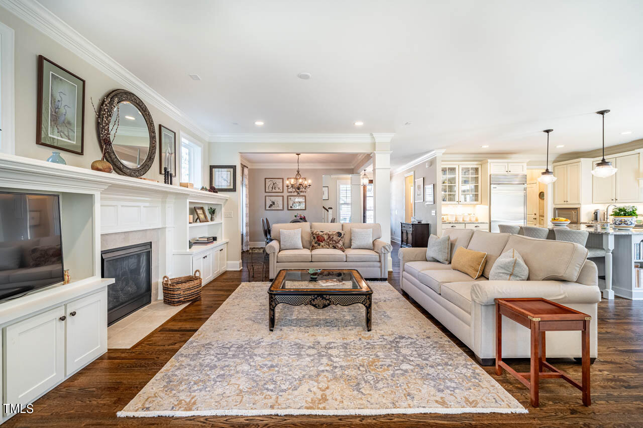 499 Bennett Mountain Trace Chapel Hill, NC 27516 - Photo 32 of 75 a living room with furniture and a fireplace