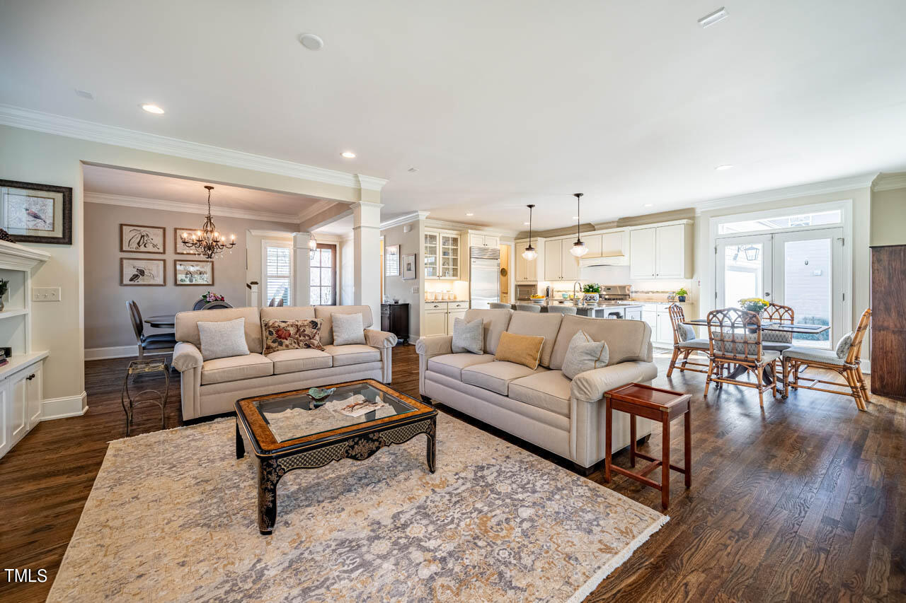 499 Bennett Mountain Trace Chapel Hill, NC 27516 - Photo 37 of 75 a living room with furniture and a wooden floor