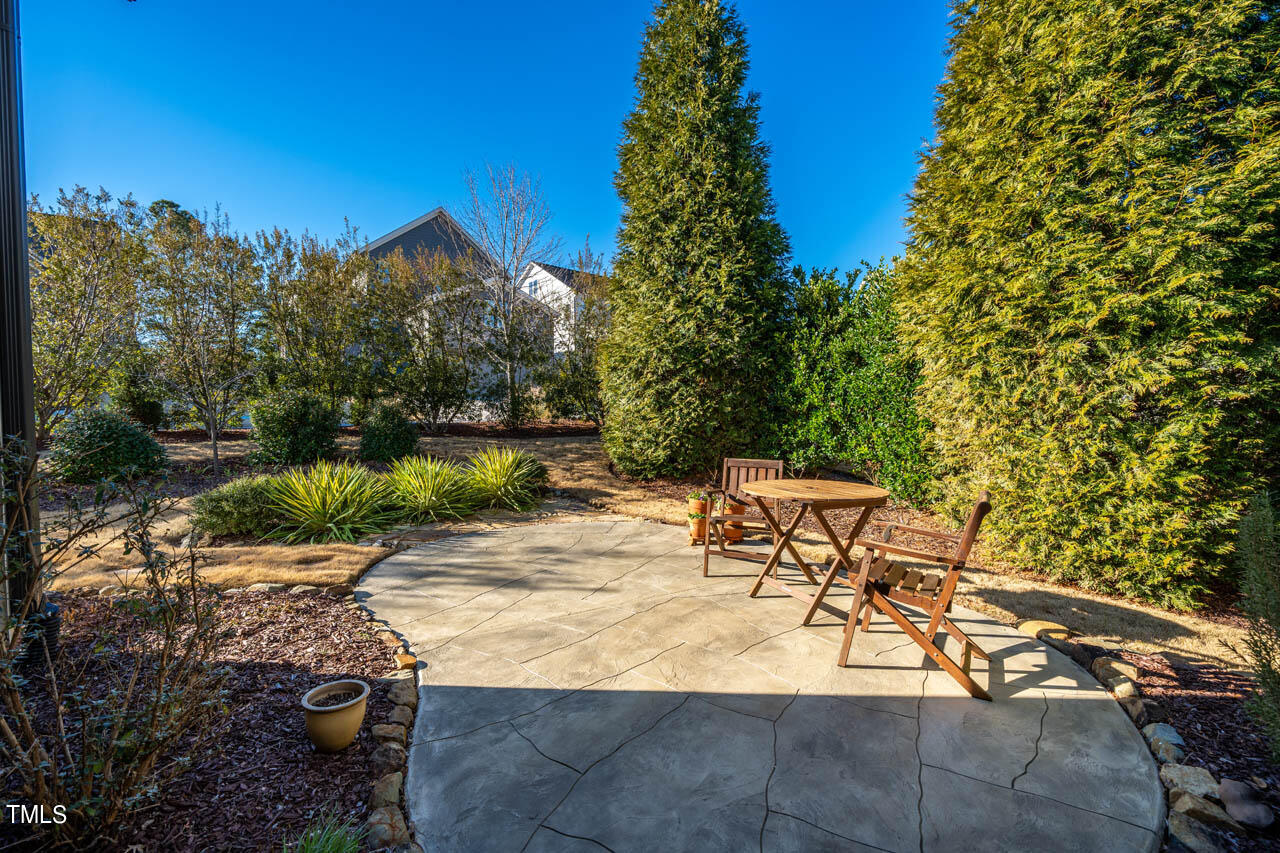 499 Bennett Mountain Trace Chapel Hill, NC 27516 - Photo 39 of 75 a view of a backyard with sitting area