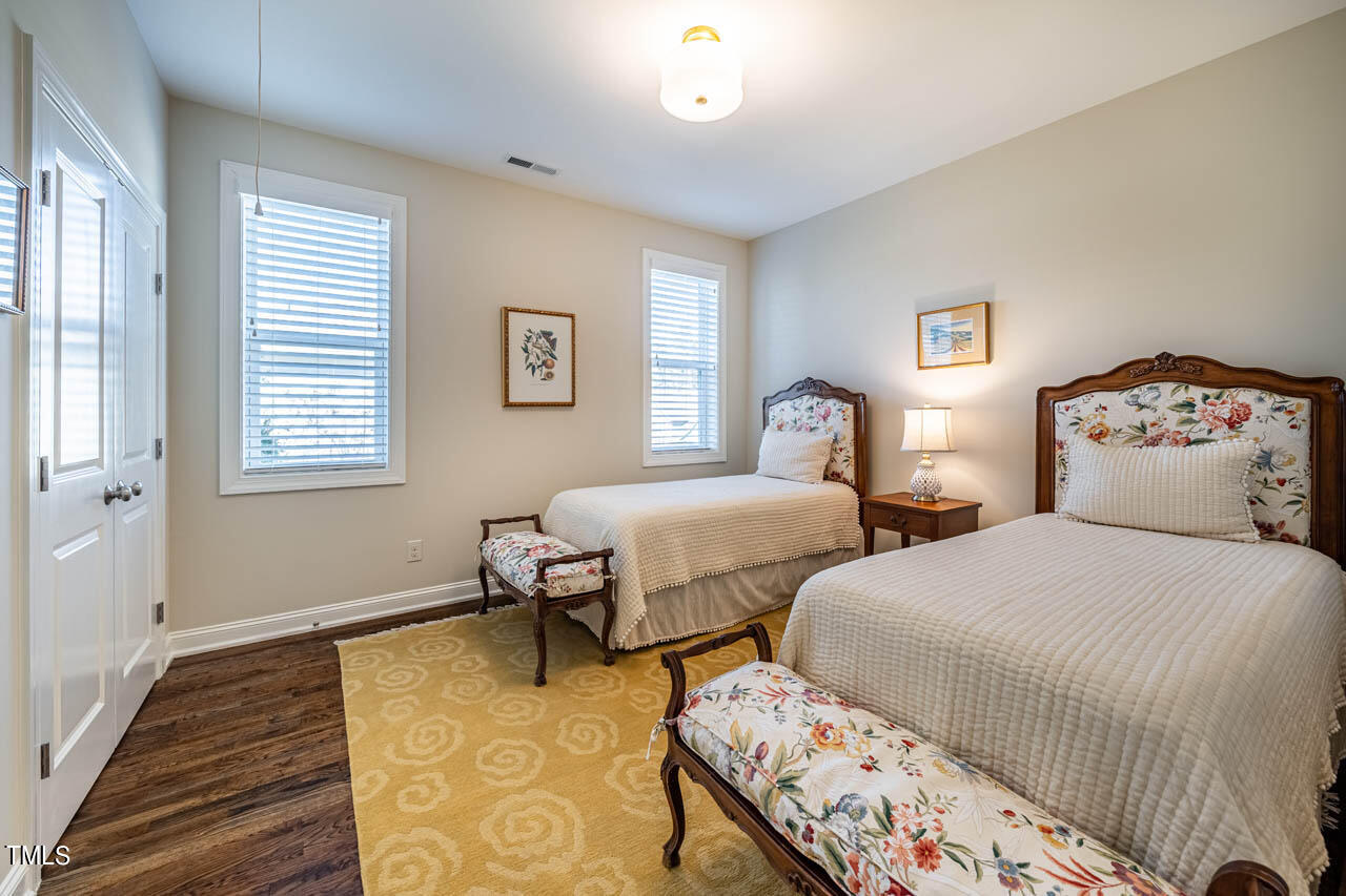 499 Bennett Mountain Trace Chapel Hill, NC 27516 - Photo 50 of 75 a bedroom with two beds and a window
