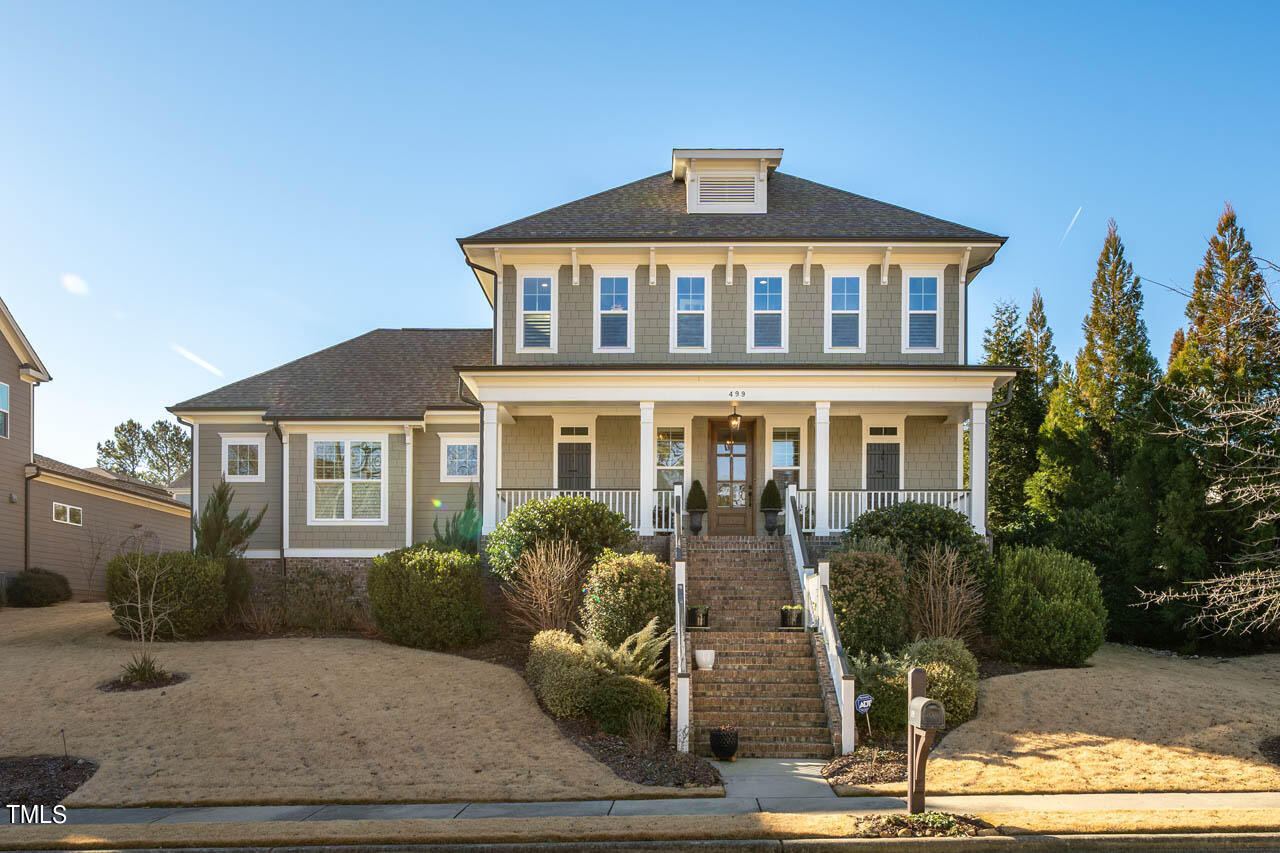 499 Bennett Mountain Trace Chapel Hill, NC 27516 - Photo 55 of 75 a front view of a house with a yard