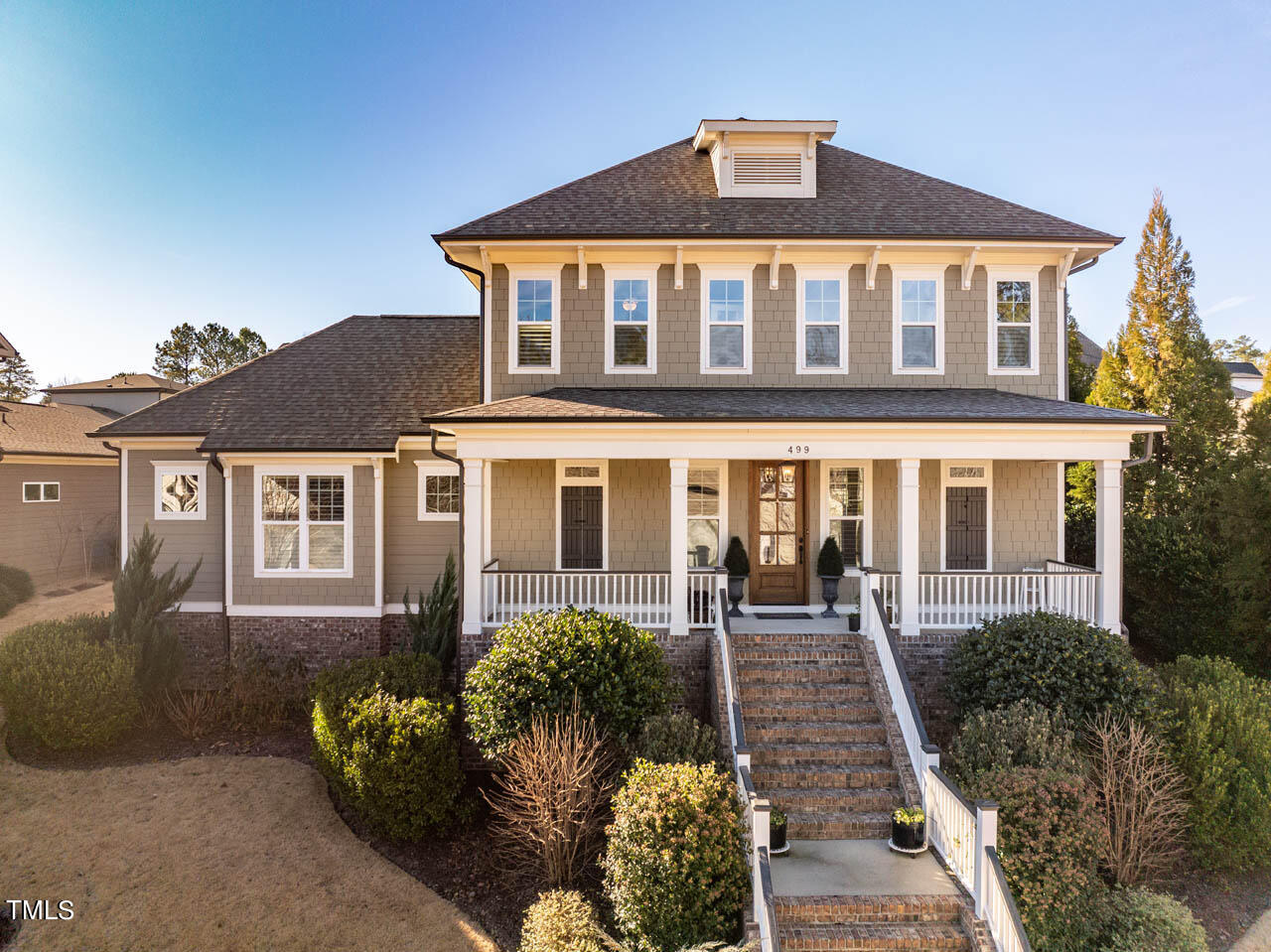 499 Bennett Mountain Trace Chapel Hill, NC 27516 - Photo 62 of 75 a front view of a house with a yard