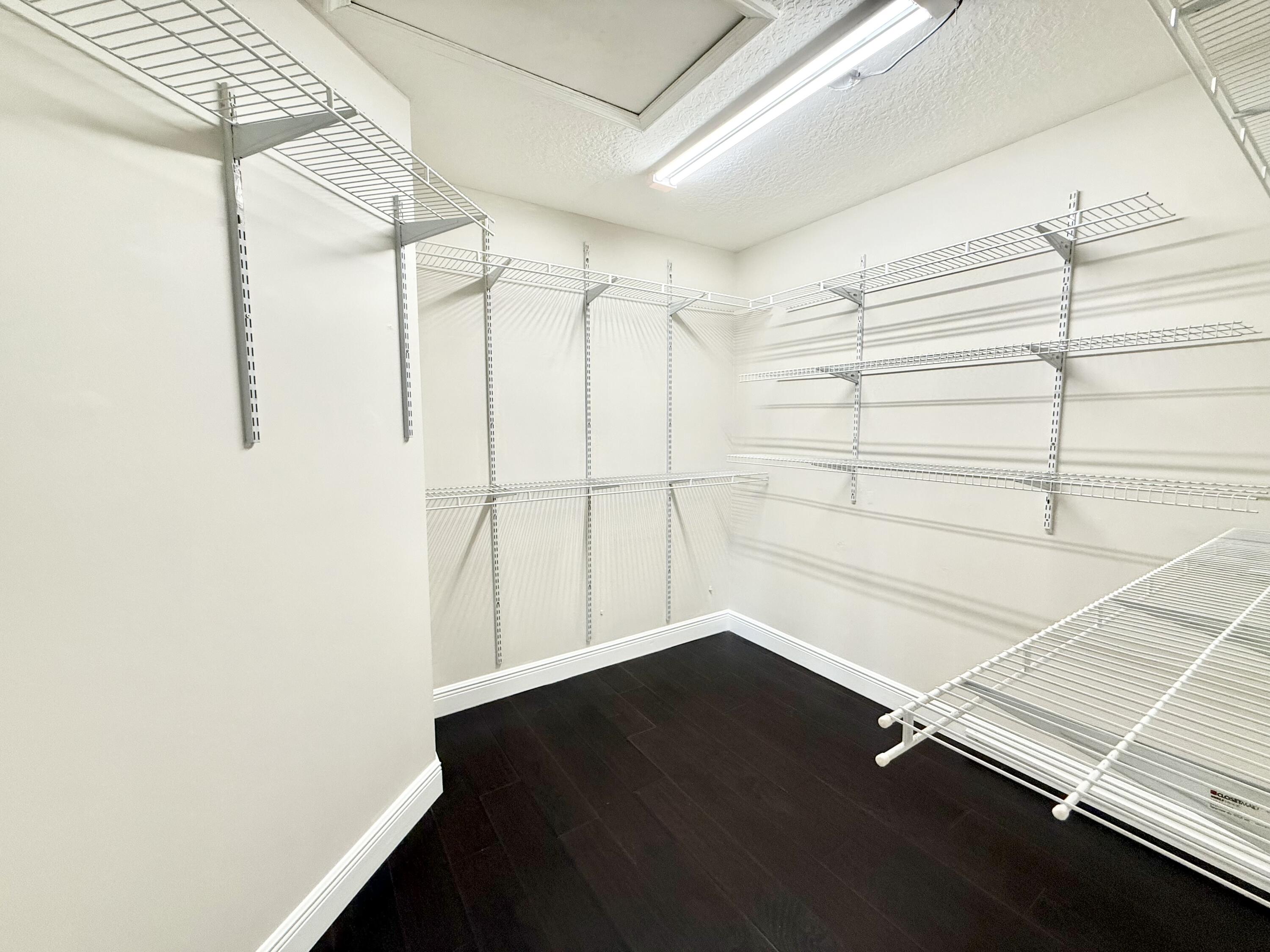 12902 Hyland Circle Boca Raton, FL 33428 - Photo 13 of 46 Master Bedroom Walk-in Closet