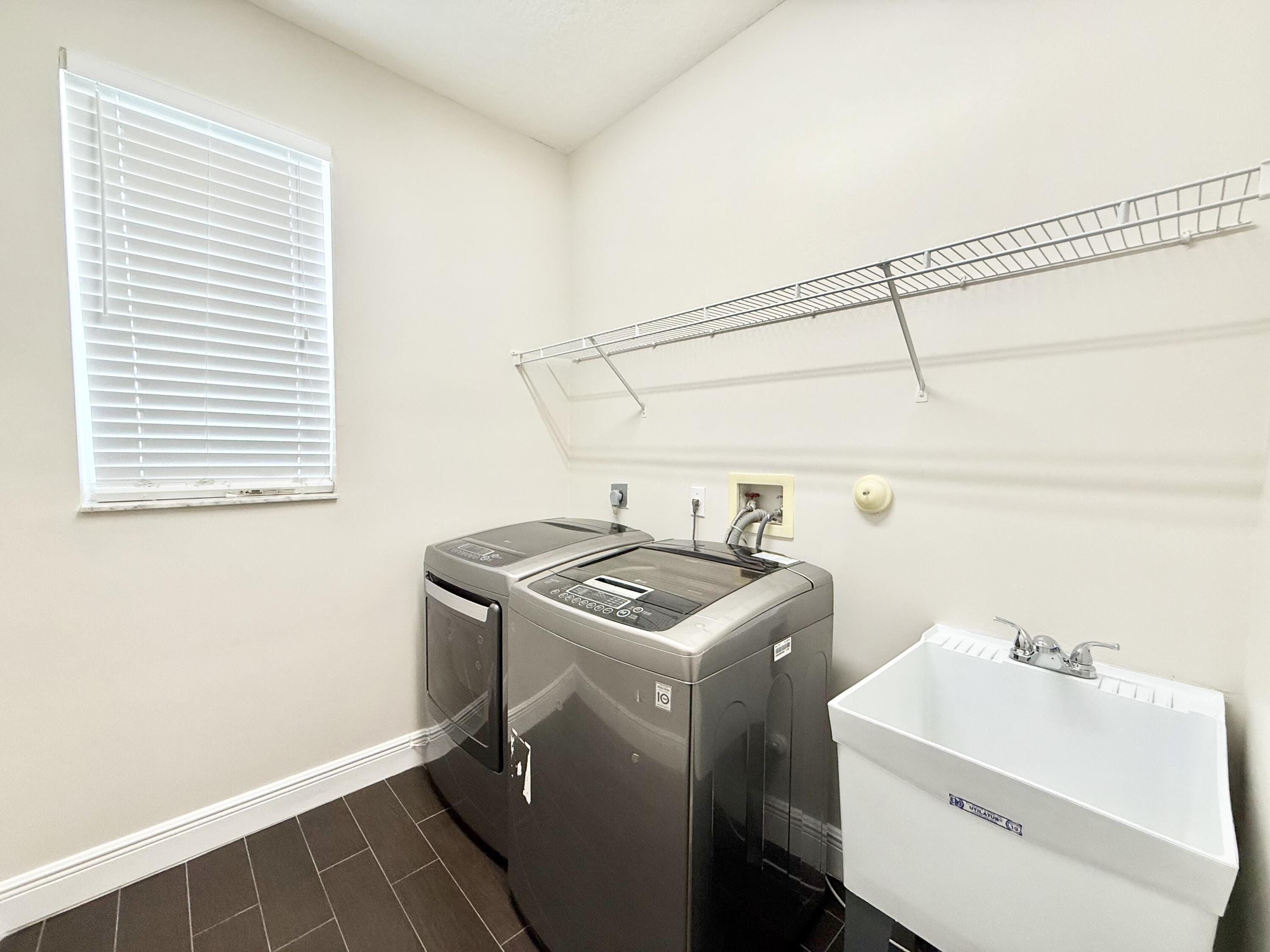 12902 Hyland Circle Boca Raton, FL 33428 - Photo 31 of 46 Laundry Room (downstairs)