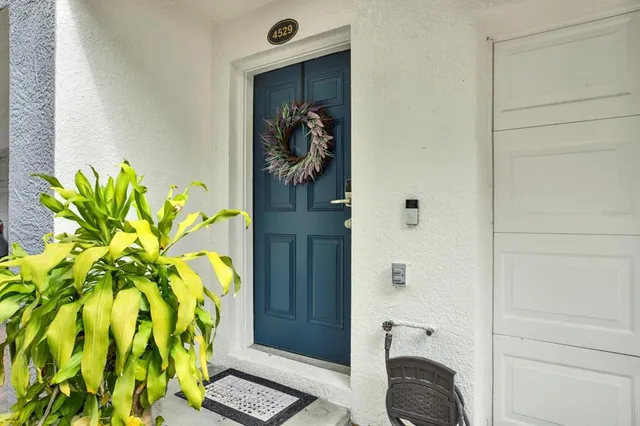 a view of entryway with wooden floor