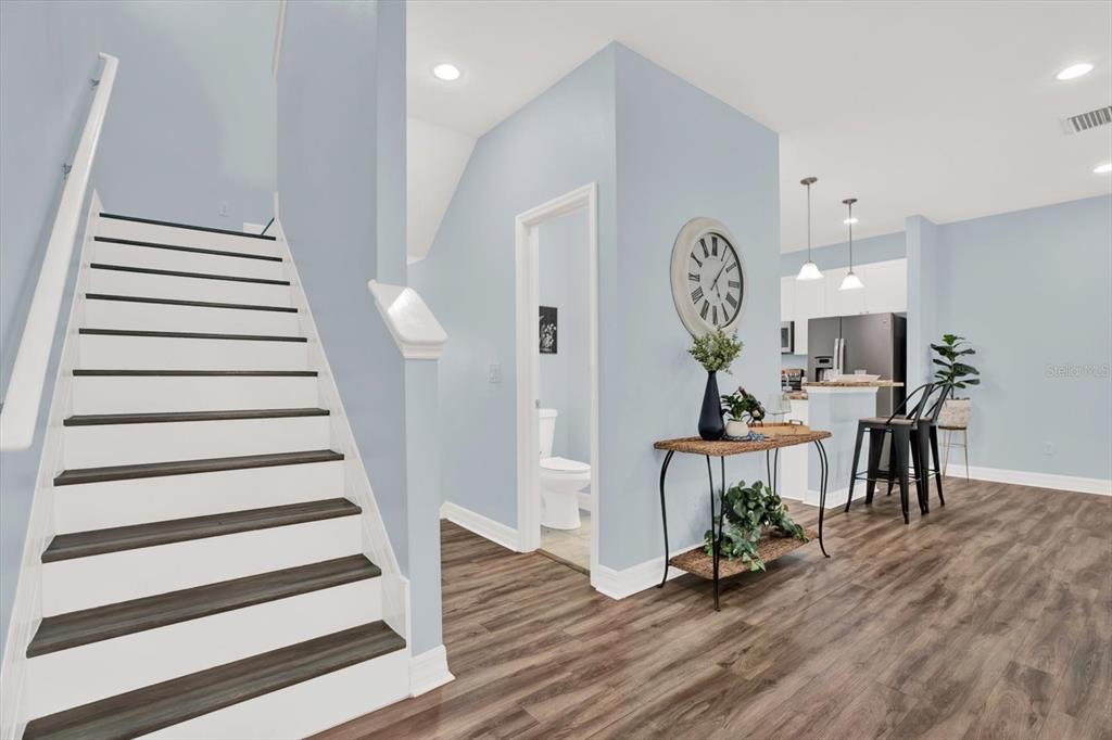 4529 Bay Spring Court Tampa, FL 33611 - Photo 23 of 66 a view of entryway with wooden floor