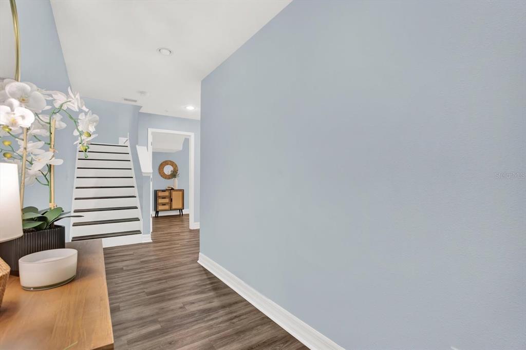 4529 Bay Spring Court Tampa, FL 33611 - Photo 3 of 66 a view of entryway with wooden floor