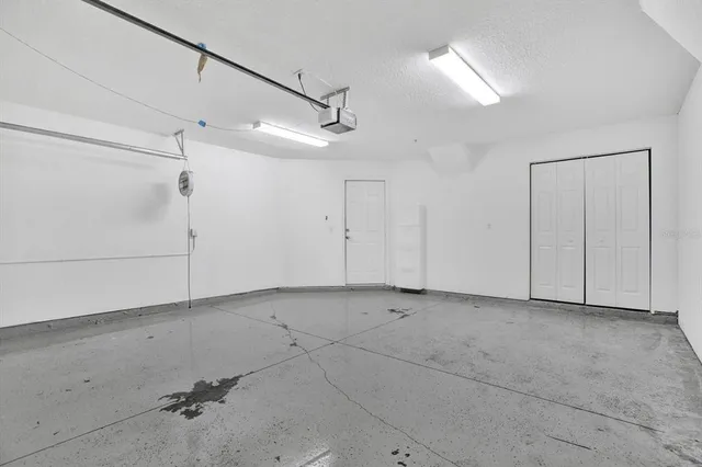 a view of a balcony with wooden floor and fence