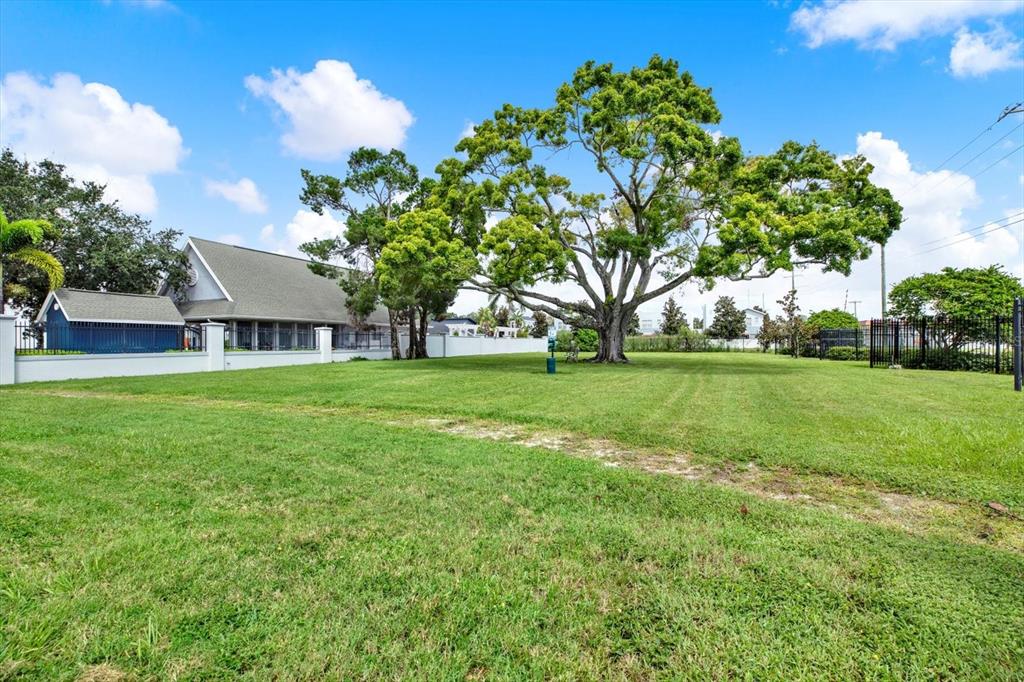 4529 Bay Spring Court Tampa, FL 33611 - Photo 45 of 66 a view of a house with a yard
