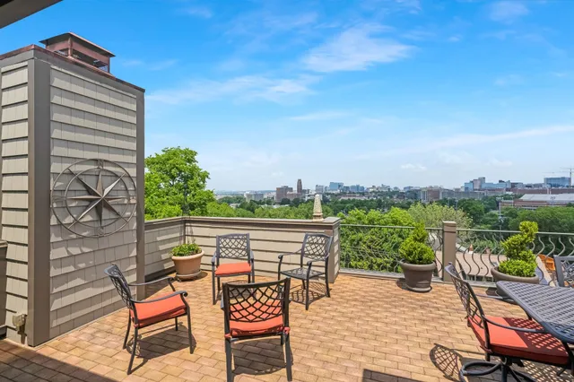 a view of a chairs and table in the terrace