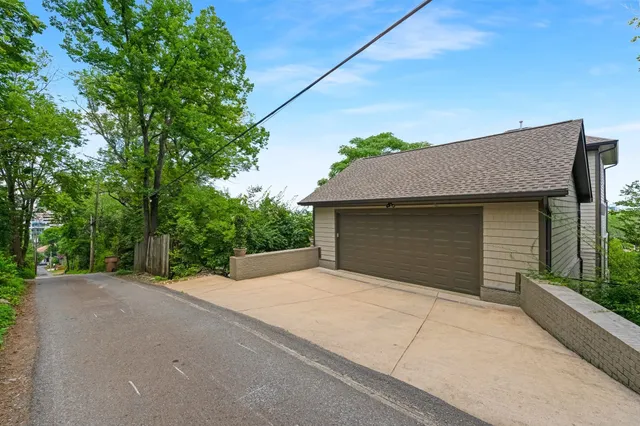 a front view of a house with a garage