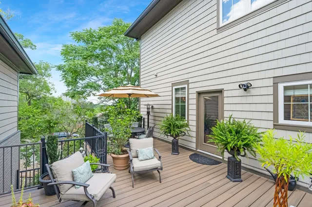 a view of a chair and table in patio of the house
