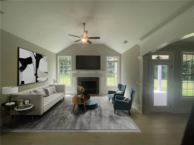 a view of kitchen and hall with wooden floor