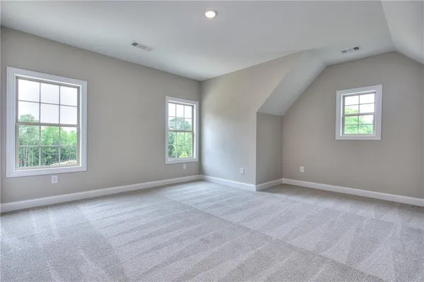 a backyard of a house with entertaining space