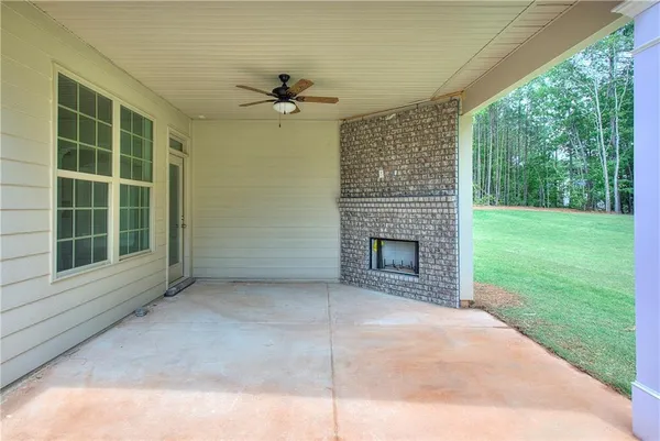 a backyard of a house with lots of green space