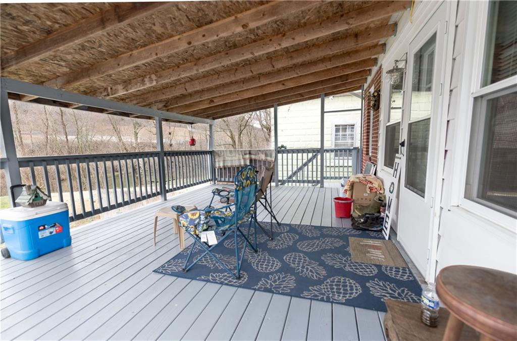 626 West Main Street Everett, PA 15537 - Photo 28 of 32 a view of balcony with wooden floor and seating space
