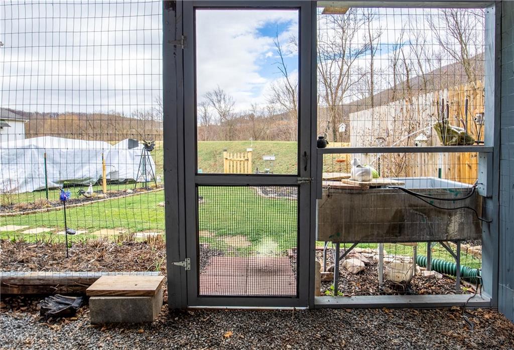 626 West Main Street Everett, PA 15537 - Photo 30 of 32 a living room filled with furniture and a table
