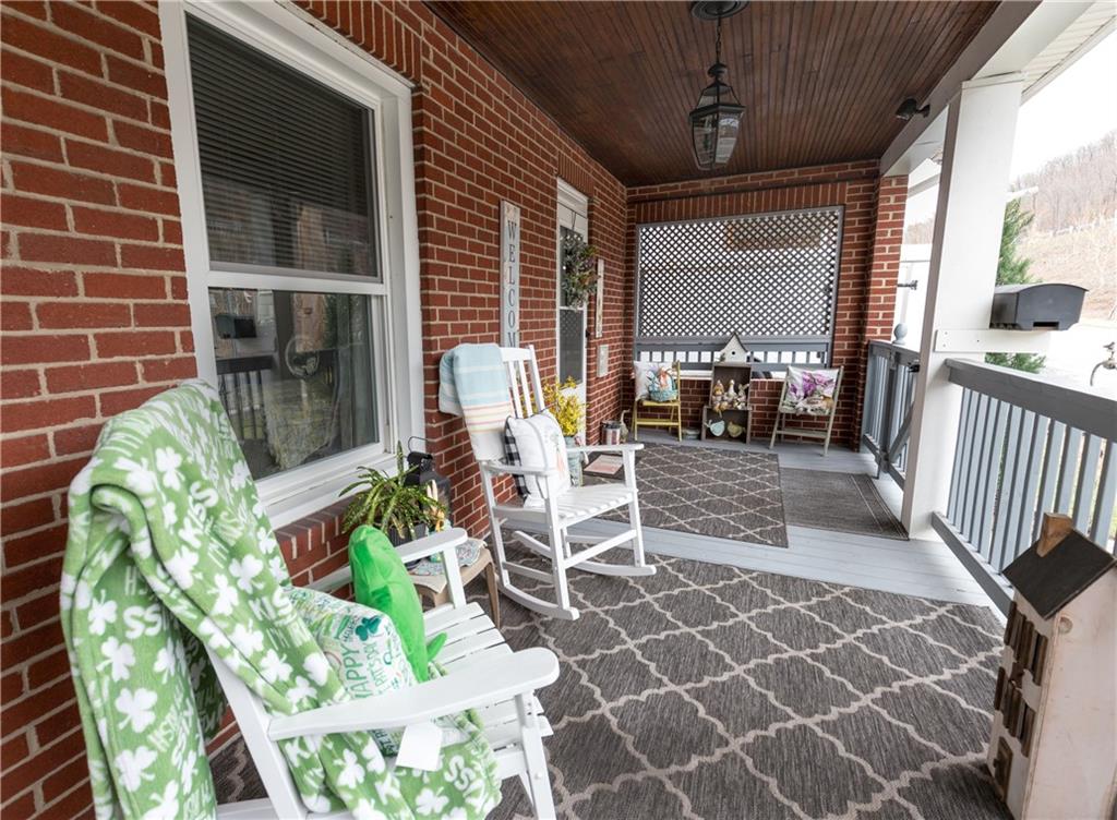 626 West Main Street Everett, PA 15537 - Photo 6 of 32 a patio with table and chairs