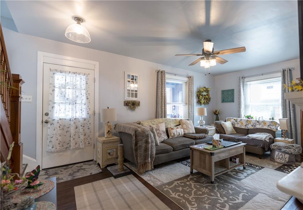 626 West Main Street Everett, PA 15537 - Photo 8 of 32 a living room with furniture a flat screen tv and a window