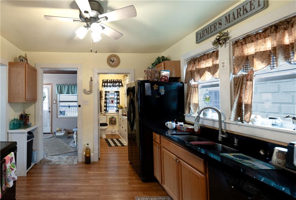 626 West Main Street Everett, PA 15537 - Photo 9 of 32 a kitchen with stainless steel appliances granite countertop a refrigerator a stove and a sink