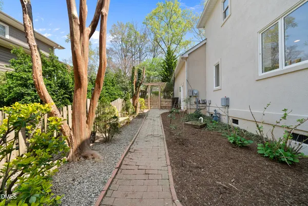 a view of a city with mountains in background